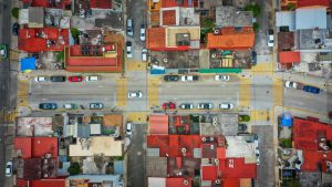 pavimentación-carros-casas-población